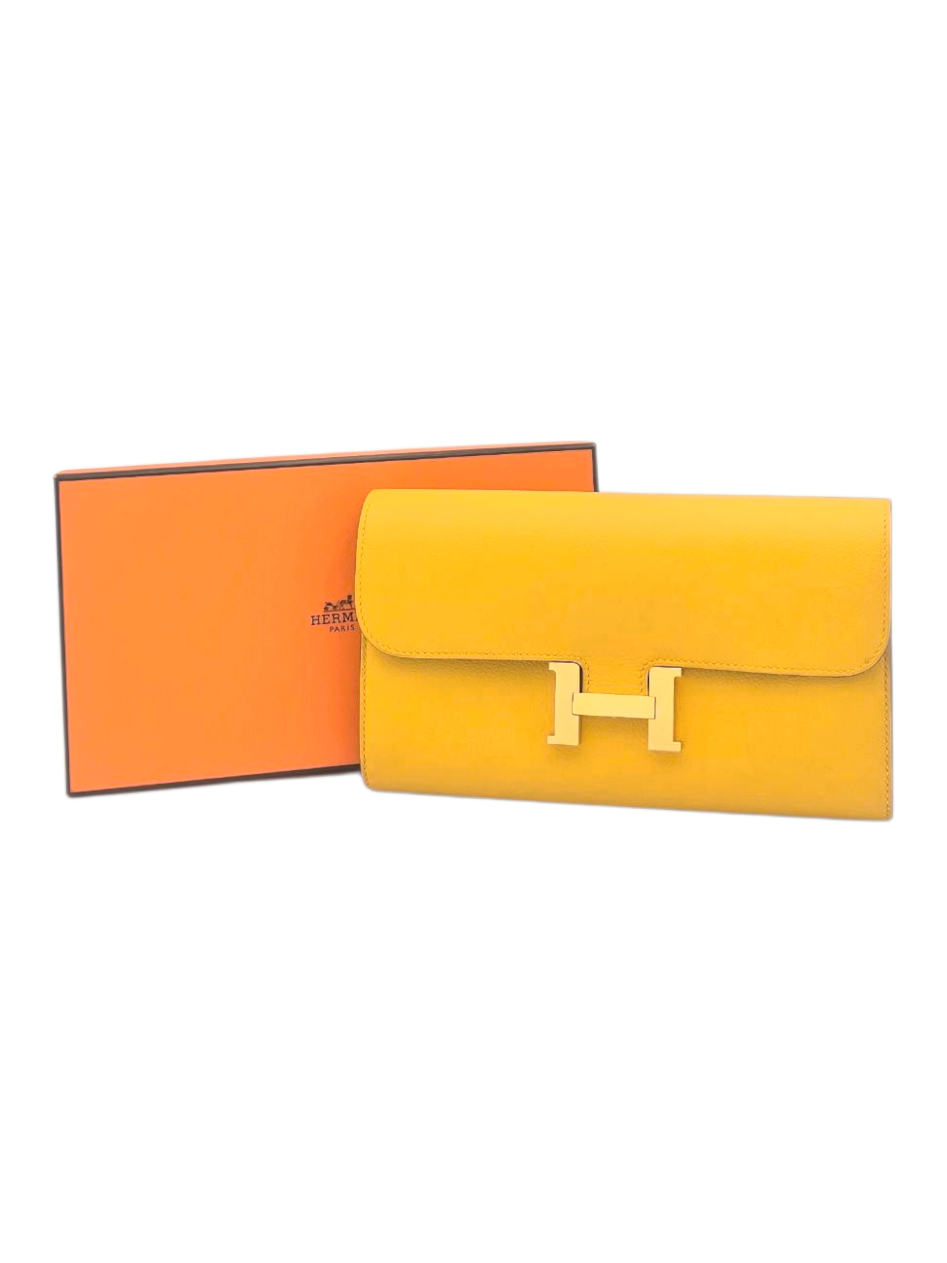 Constance Wallet Long Yellow in Clemence, Gold hardware