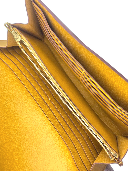 Constance Wallet Long Yellow in Clemence, Gold hardware