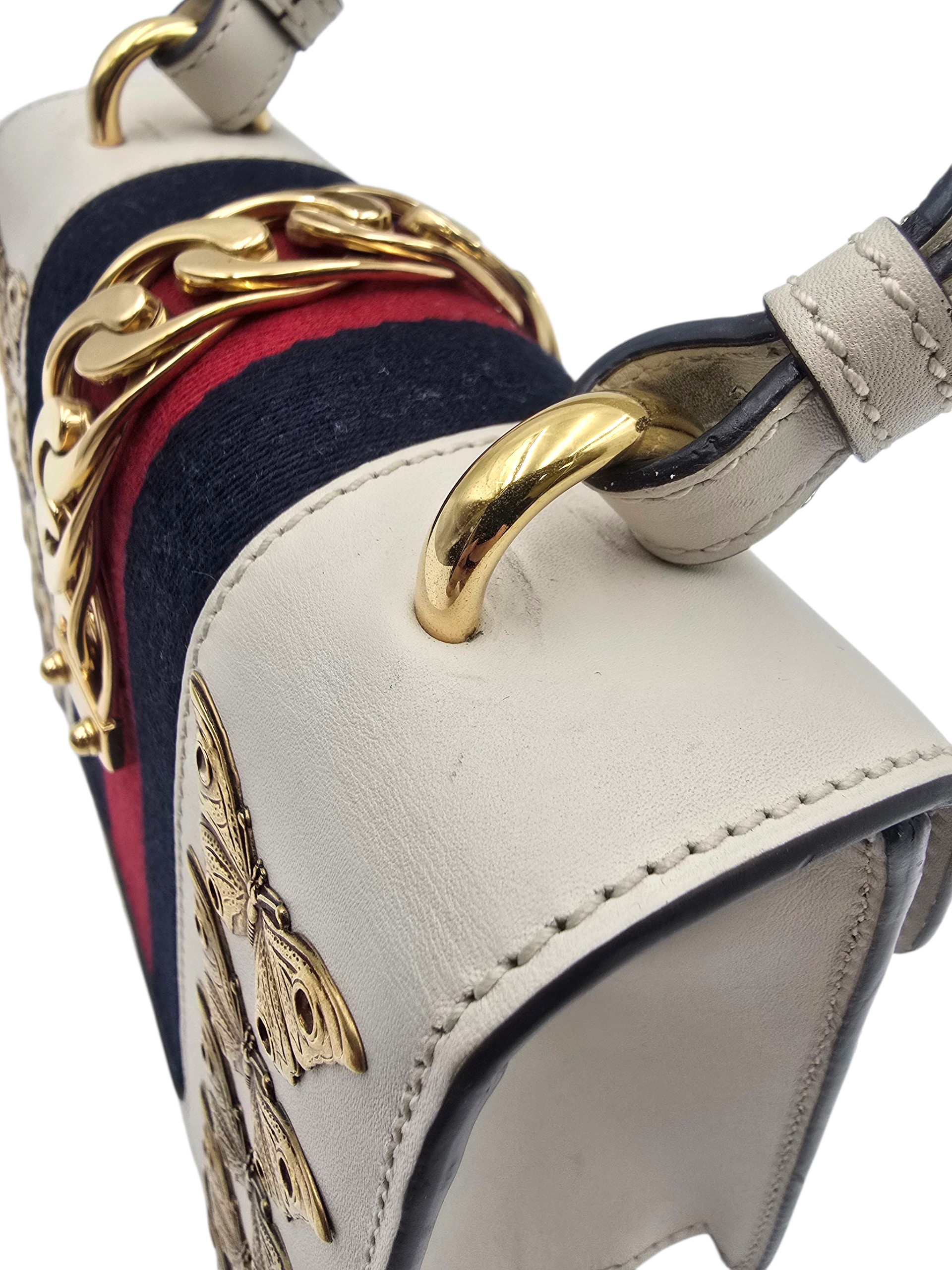 Animalier Sylvie Stud Embellished Mini White Top Handle Bag in Calfskin, Gold hardware