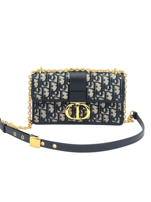 Montaigne 30 Blue Shoulder Bag in Coated Canvas, Gold hardware