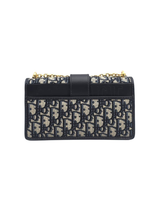 Montaigne 30 Blue Shoulder Bag in Coated Canvas, Gold hardware